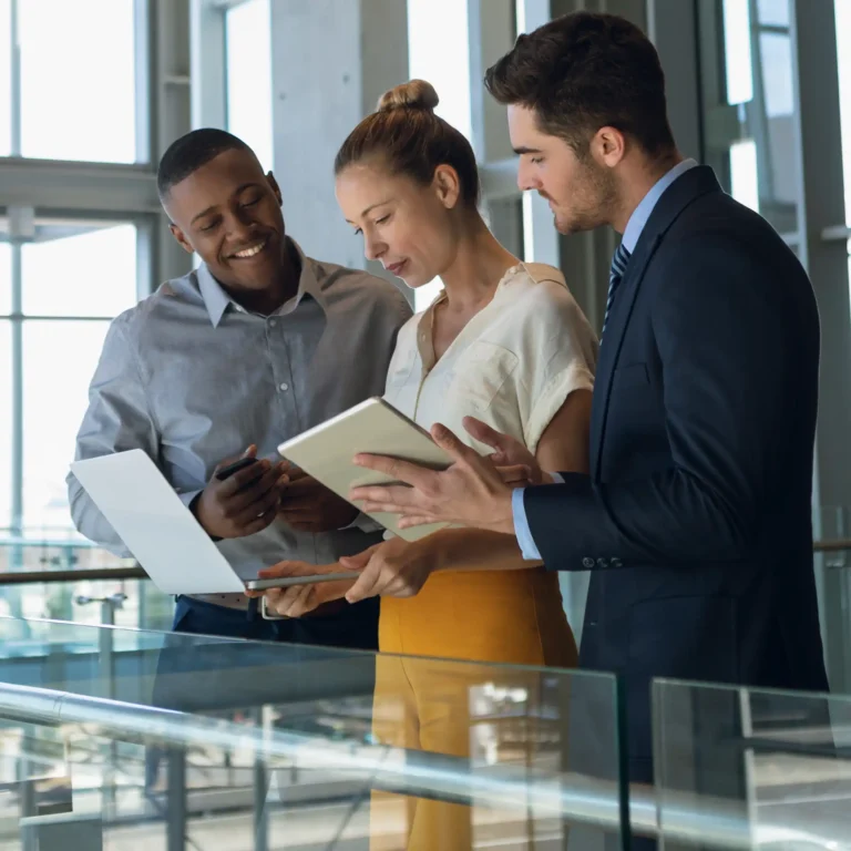 Business colleagues standing in modern office